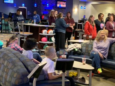 Family playing bowling