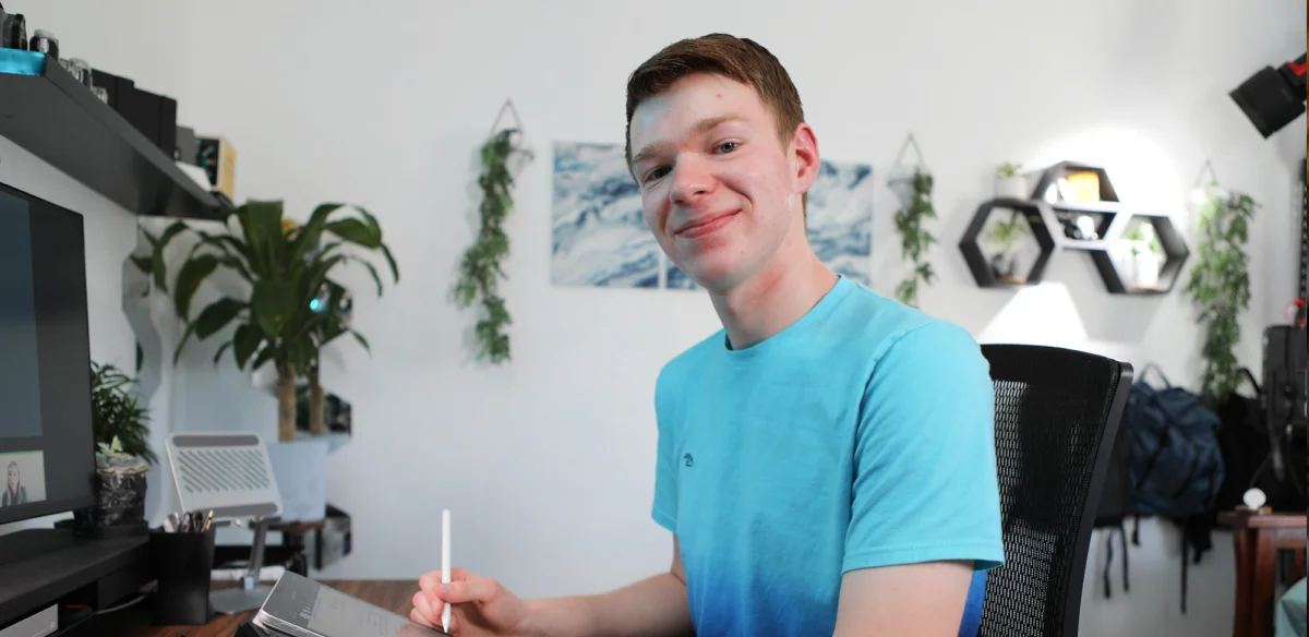 High school student taking notes at his house